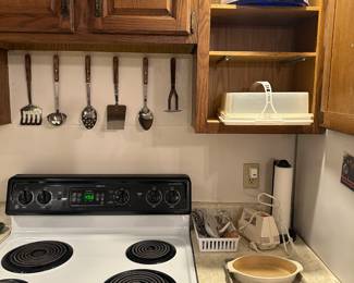 Cake containers, pampered chef stone ware, hand mixer, utensils, stove