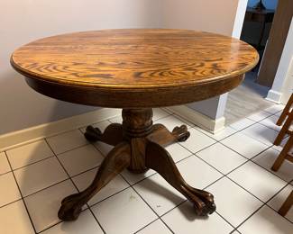 42" diameter oak table with claw feet - $300         Text Joanne at 708-890-4890 to schedule your appointment now! 