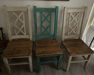 4 Chairs 2 green & 2 natural with a table