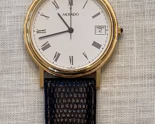 14K Movado Watch (black band)
