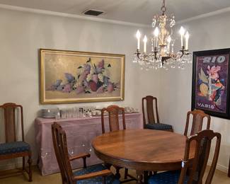 This dining table and matching chairs is a wonderful set and would make a great gift.