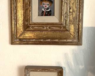 There are a number of framed artwork pieces, of which two of them are featured here.