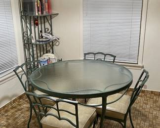 This smaller round breakfast table is a fine addition to your dining room.  