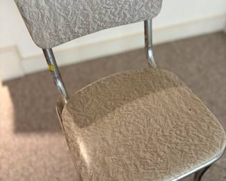 two chairs and matching table