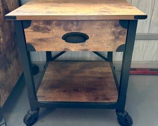 One drawer side table on wheels