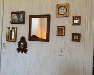 Lots of wall art some vintage