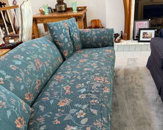 Oriental couch with flower pattern on blue