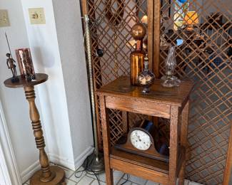 Plant stand, oak table and copper decor