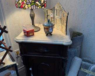 Marble top night stand or end table, Tiffany’s style lamp, decor and rugs