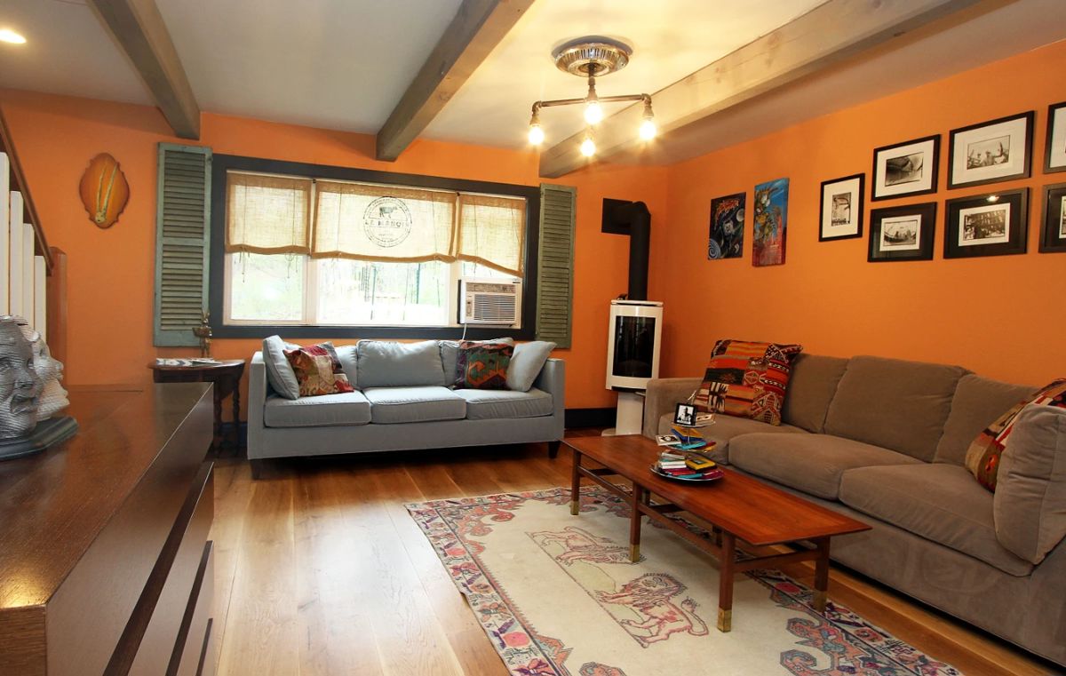 Sofas, coffee table, pop up TV cabinet, artwork, rugs