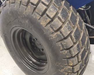 New Holland TD5050 tractor with Custom mowing wheels