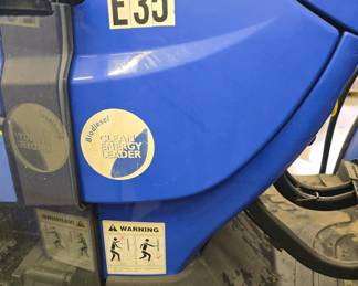New Holland TD5050 tractor with Custom mowing wheels
