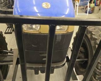 New Holland TD5050 tractor with Custom mowing wheels