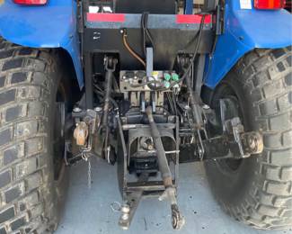 New Holland TD5050 tractor with Custom mowing wheels