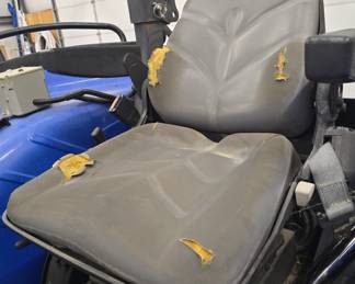 New Holland TD5050 tractor with Custom mowing wheels