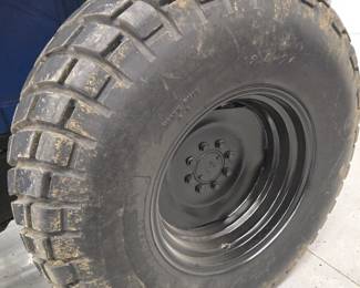 New Holland TD5050 tractor with Custom mowing wheels