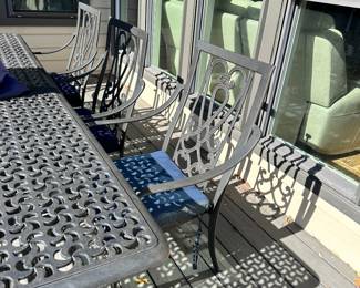 #26 - $1,000 - Metal Table w/8 chairs 28"Hx107"Lx42"D   Chairs 41"x25"x25" w/umbrella