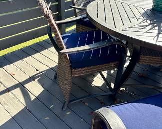 #28 - $275 - Round metal table w/6 chairs 33"Hx5'R   Chairs 39"Hx25"x25  as is (wear on top)