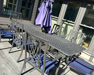 #26 - $1,000 - Metal Table w/8 chairs 28"Hx107"Lx42"D   Chairs 41"x25"x25" w/umbrella
