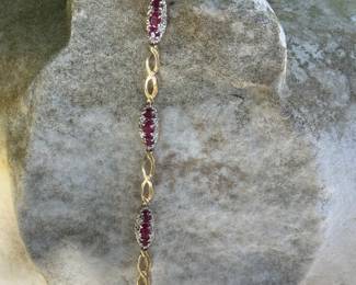 #115- $400 - Ruby and yellow gold bracelet 10kt gold, 7 1/2".