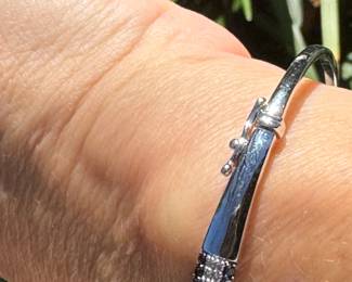 #120- $450 - black and white diamonds bangle bracelet white gold. 10kt gold. 
