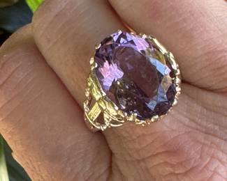 #117 - $450 - Large Amethyst ring on yellow gold with elephant carved on setting on 10kt gold. 