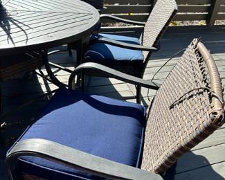 #28 - $275 - Round metal table w/6 chairs 33"Hx5'R   Chairs 39"Hx25"x25  as is (wear on top)