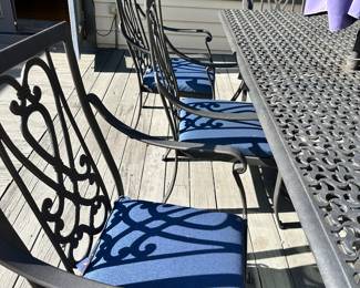 #26 - $1,000 - Metal Table w/8 chairs 28"Hx107"Lx42"D   Chairs 41"x25"x25" w/umbrella