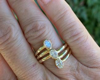 #116 - $850 - 1 1/2 ctw diamonds three oval diamonds modern ring on 14kt yellow gold.