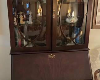 Jasper Cabinet Co. Secretary w/ Flame Mahogany & Bevel glass doors.