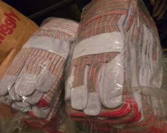 Lots of leather & canvas gloves