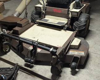 Mower has a thatcher attachment also