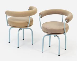 11 . Charlotte Perriand for Cassina Pair of LC7 Swivel Chairs (ca. 1980s)