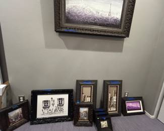 Basement office has the art and...