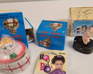 Mixed lot: bell, lighter, denture holder, more