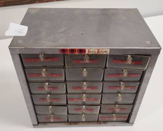 metal organizer cabinet with misc items