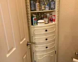 Corner cabinet with lots of Bath and Body!