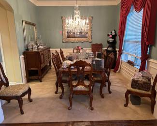 Formal Dining Room including matching Buffet. 10 Chairs with table and 2 leaves.