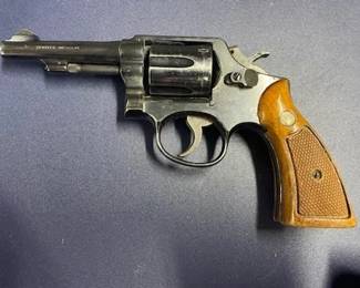 Antique Smith & Wesson 38 Special CTG Military and Police Revolver. This Military and Police Revolver was launched by Smith and Wesson in 1899 as the 1st Revolver  to chamber the .38 Special Cartridge (arguably the most popular and successful centerfire revolver ammo ever produced. The pistol is renowned for it's accuracy. The serial number is D622116, which seems to put this gun as manufactured between 1915 and 1942. This fits with the history of this pistol. It was worn by a Middle Tennessee police officer until his retirement in very early 1970's. Not only is the pistol offered but to go with it is all the original equipment including holster and gun belt, cartridge holders, hand cuffs, and more!!! We will be taking offers until noon on Saturday. Offers to start at $500 for details text or phone me. Offers will end at noon on Saturday.