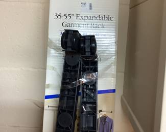 NEW IN BOX! 35-55 inch expandable garment rack