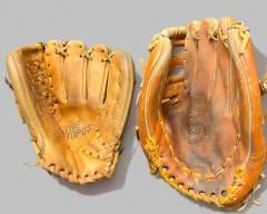 Vintage Wilson Dual Hinge Leather Softball Glove A9820 and a Superior Sporting Goods The Octopus Leather Baseball Glove
