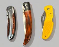 Lot of Three Pocket Knives Including Timber Wolf, Rostfrei and a Winchester
