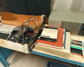 Vintage Texas Instruments computer with accessories