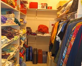 Vintage linens, luggage and clothing