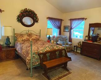 Another iron bed and pew bench