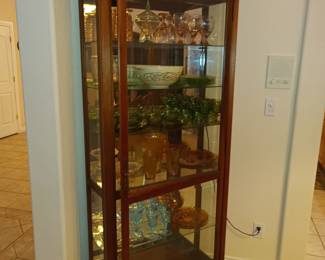 Curio with pink, green and blue glass