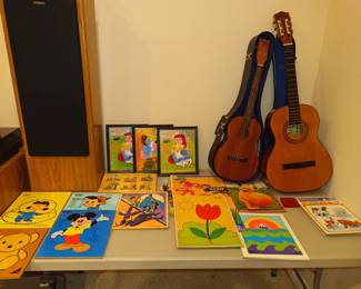 Old wooden tray puzzles and guitars