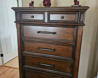 Solid wood chest of drawers.