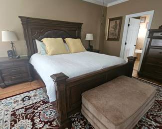 Solid wood king size bed with headboard, footboard and side boards.