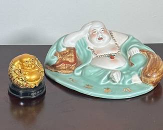 (2pc) PAIR BUDDHA STATUES | Including: ceramic lying down Buddha stature, and smaller gilt laughing Buddha statue. -  h. 3 x w. 8 x l. 10 in (larger)